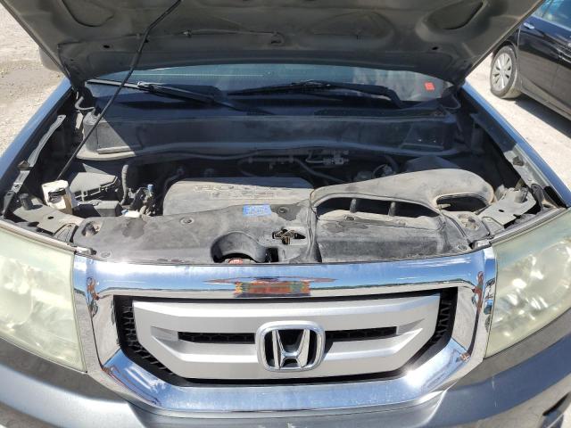 Photo 12 from auction – 2011 HONDA PILOT TOUR with VIN 5FNYF4H90BB012309