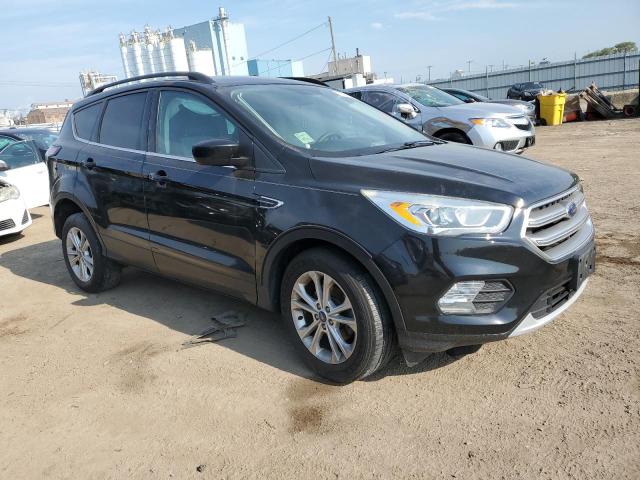 Photo 4 from auction – 2017 FORD ESCAPE SE with VIN 1FMCU0GD1HUE02684