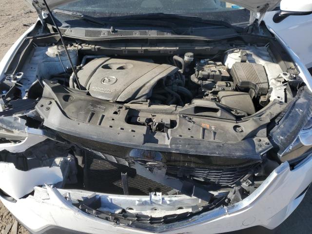Photo 12 from auction – 2015 MAZDA CX-5 with VIN JM3KE4DY9F0435665