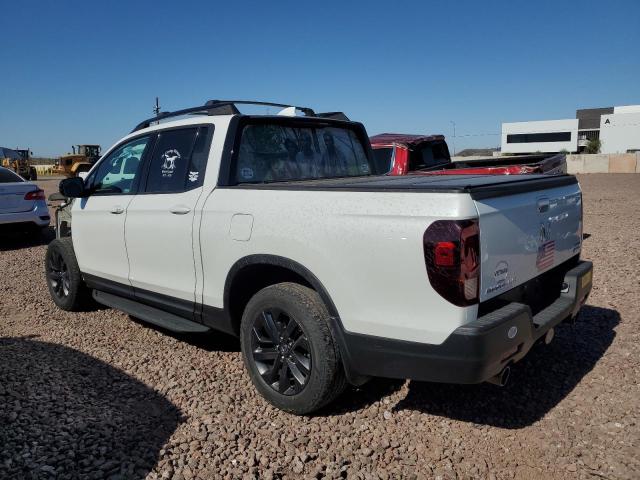 Photo 2 from auction – 2022 HONDA RIDGELINE with VIN 5FPYK3F10NB000627