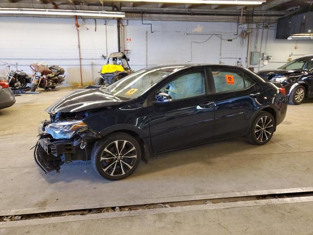 TOYOTA COROLLA L 2018 with VIN 2T1BURHE4JC990997 - Photo from auction