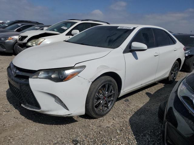 TOYOTA CAMRY LE 2016 with VIN 4T1BF1FKXGU144370 - Photo from auction