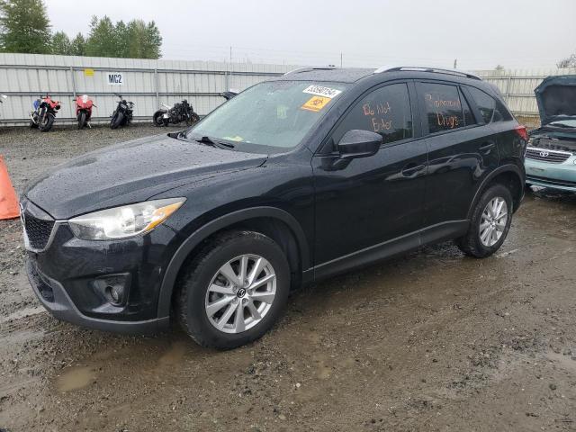 MAZDA CX-5 TOURI 2014 with VIN JM3KE2CYXE0423979 - Photo from auction