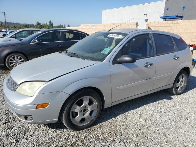 FORD FOCUS ZX5 2007 with VIN 1FAHP37N97W165088 - Photo from auction