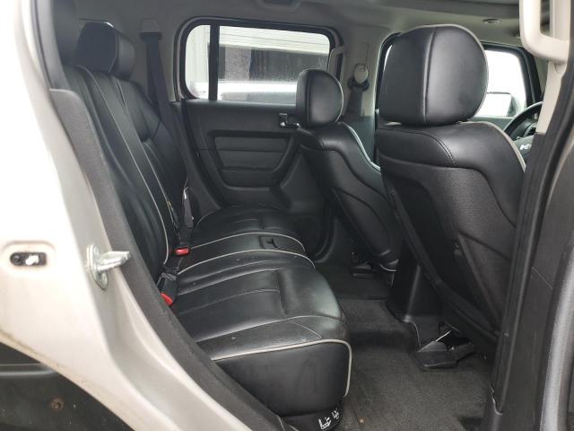 Photo 10 from auction – 2006 HUMMER H3 with VIN 5GTDN136068302724
