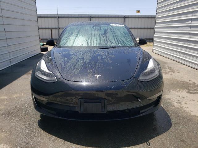 Photo 5 from auction – 2022 TESLA MODEL 3 with VIN 5YJ3E1EA9NF304457