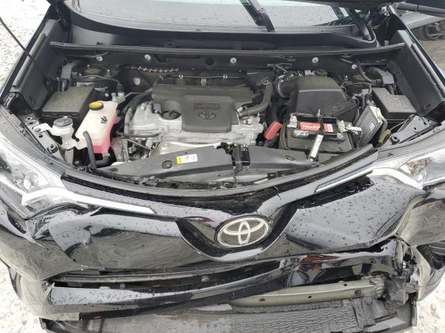 Photo 12 from auction – 2018 TOYOTA RAV4 LE with VIN 2T3ZFREV7JW519557