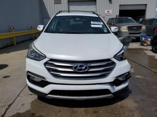 Photo 5 from auction – 2018 HYUNDAI SANTA FE S with VIN 5NMZU3LB1JH076628