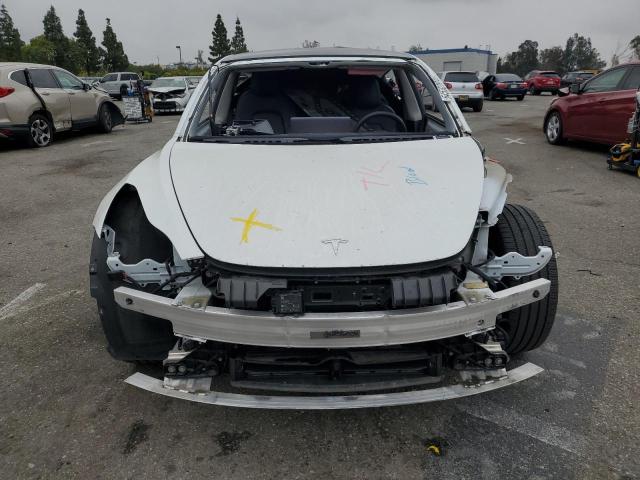 Photo 5 from auction – 2021 TESLA MODEL 3 with VIN 5YJ3E1EA6MF867660