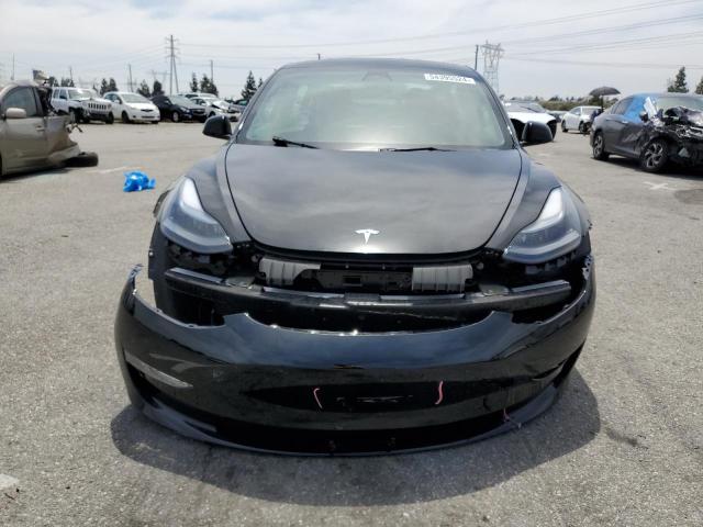 Photo 5 from auction – 2022 TESLA MODEL 3 with VIN 5YJ3E1EB2NF138095