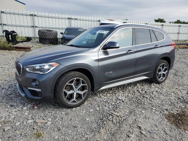 BMW X1 XDRIVE2 2017 with VIN WBXHT3C35H5F71862 - Photo from auction