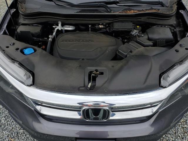Photo 12 from auction – 2021 HONDA PILOT EXL with VIN 5FNYF5H58MB013083