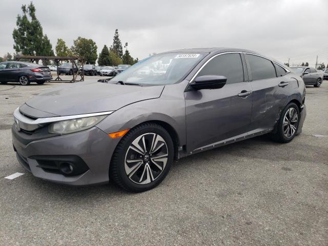 HONDA CIVIC EX 2016 with VIN 19XFC1F35GE000215 - Photo from auction