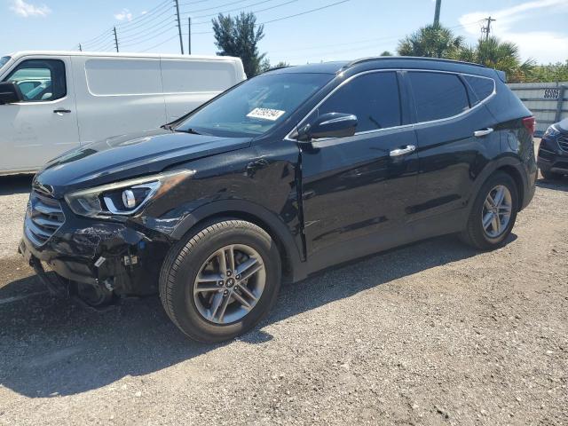 HYUNDAI SANTA FE S 2017 with VIN 5NMZU3LB9HH012606 - Photo from auction