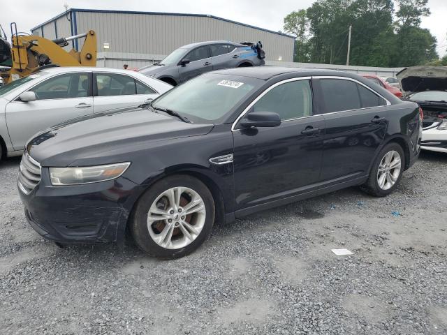 FORD TAURUS SE 2015 with VIN 1FAHP2D9XFG180662 - Photo from auction