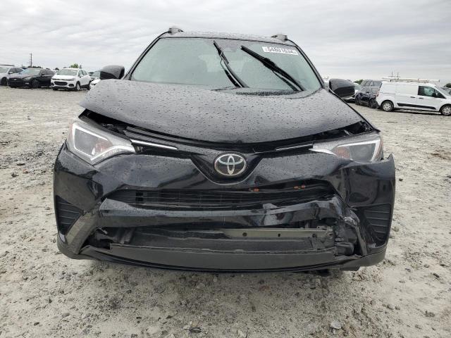 Photo 5 from auction – 2018 TOYOTA RAV4 LE with VIN 2T3ZFREV7JW519557
