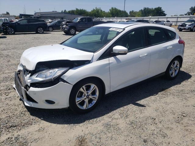 FORD FOCUS SE 2014 with VIN 1FADP3K20EL260729 - Photo from auction