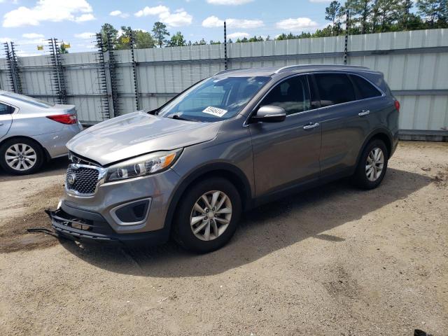 KIA SORENTO LX 2016 with VIN 5XYPG4A35GG085609 - Photo from auction
