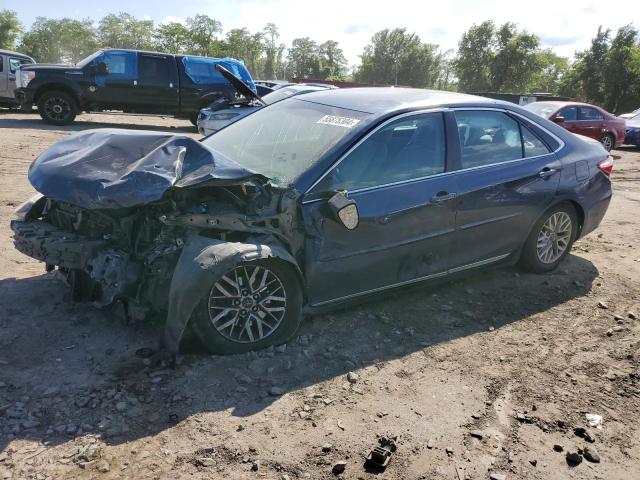 TOYOTA CAMRY LE 2016 with VIN 4T4BF1FKXGR575202 - Photo from auction