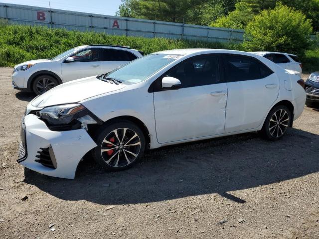 TOYOTA COROLLA L 2017 with VIN 5YFBURHE2HP581603 - Photo from auction