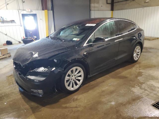 TESLA MODEL X 2018 with VIN 5YJXCDE2XJF089988 - Photo from auction