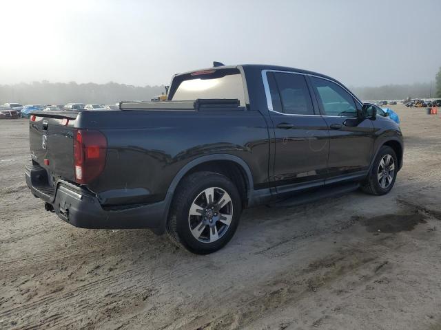 Photo 3 from auction – 2017 HONDA RIDGELINE with VIN 5FPYK2F60HB005269