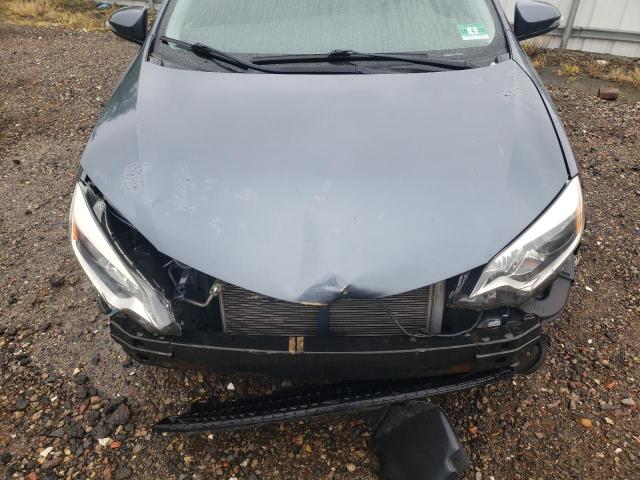 Photo 11 from auction – 2014 TOYOTA COROLLA L with VIN 2T1BURHE4EC213466