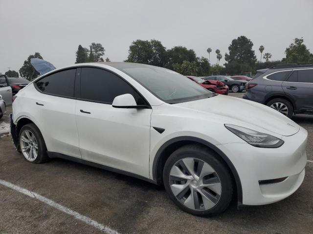 Photo 4 from auction – 2023 TESLA MODEL Y with VIN 7SAYGDEE5PA115229