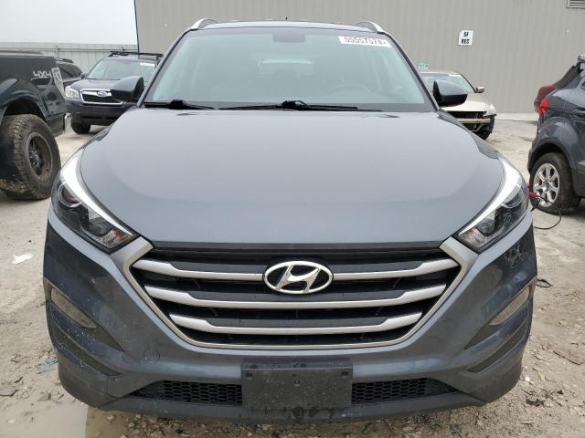 Photo 5 from auction – 2017 HYUNDAI TUCSON LIM with VIN KM8J3CA41HU386149