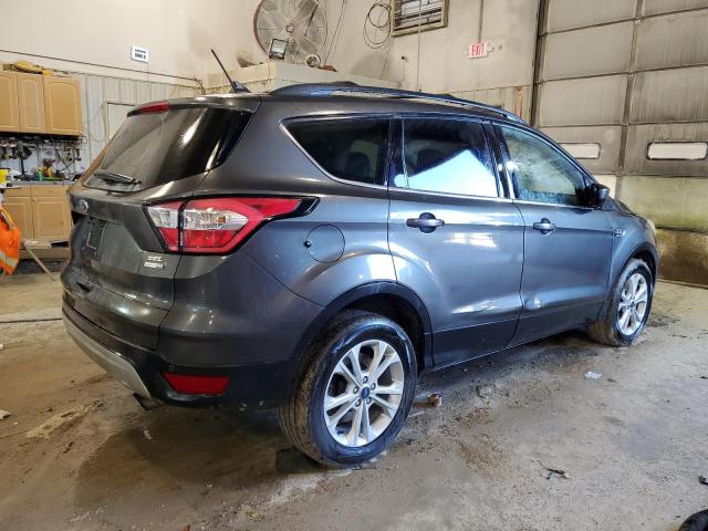Photo 3 from auction – 2018 FORD ESCAPE SEL with VIN 1FMCU9HD0JUB33554