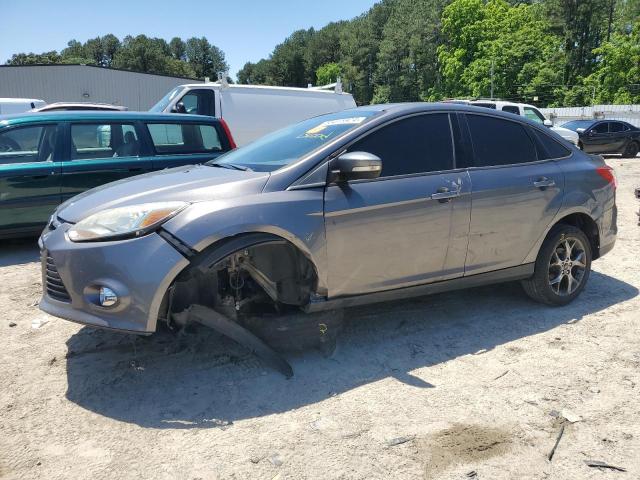 FORD FOCUS SE 2014 with VIN 1FADP3F22EL115573 - Photo from auction