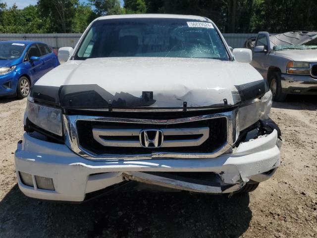 Photo 5 from auction – 2010 HONDA RIDGELINE with VIN 5FPYK1F53AB006228