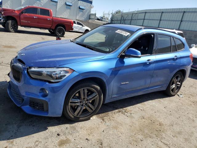 BMW X1 XDRIVE2 2018 with VIN WBXHT3C3XJ5K27477 - Photo from auction