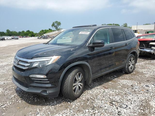 HONDA PILOT EXL 2018 with VIN 5FNYF5H5XJB021911 - Photo from auction