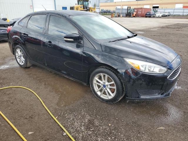 Photo 4 from auction – 2016 FORD FOCUS SE with VIN 1FADP3F22GL353071