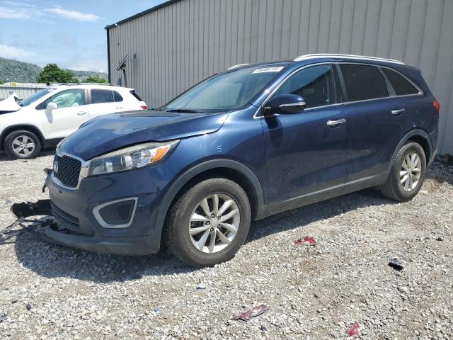 KIA SORENTO LX 2016 with VIN 5XYPG4A31GG126396 - Photo from auction