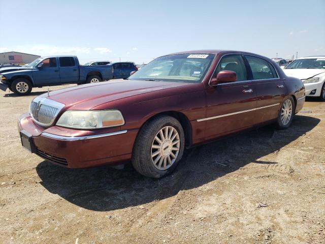 LINCOLN TOWN CAR E 2003 with VIN 1LNHM81W93Y634871 - Photo from auction