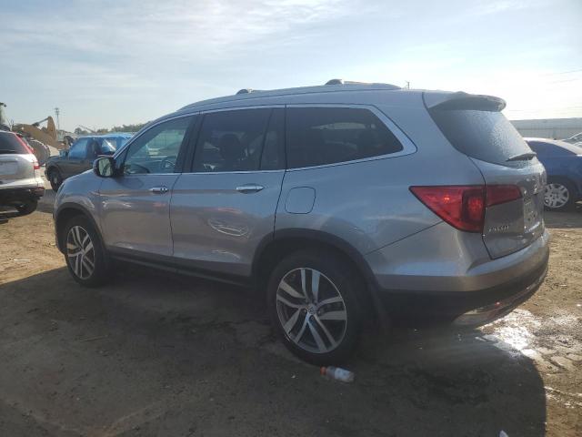 Photo 2 from auction – 2016 HONDA PILOT ELIT with VIN 5FNYF6H00GB112009