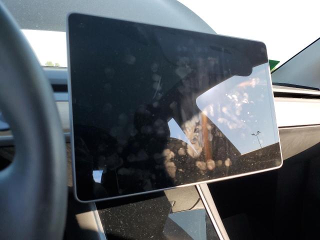 Photo 9 from auction – 2021 TESLA MODEL Y with VIN 5YJYGDEE8MF067799