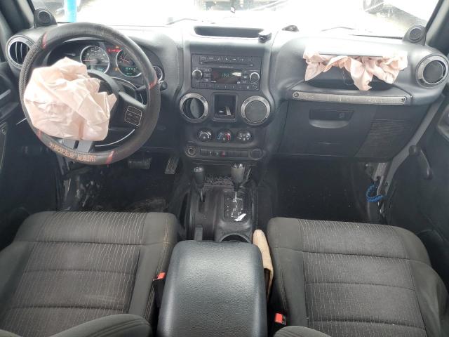 Photo 8 from auction – 2012 JEEP WRANGLER U with VIN 1C4BJWDG0CL122330