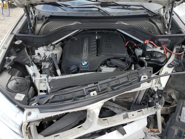 Photo 12 from auction – 2014 BMW X5 SDRIVE3 with VIN 5UXKR2C54E0C01510