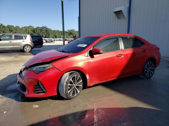 TOYOTA COROLLA L 2017 with VIN 5YFBURHE1HP677268 - Photo from auction