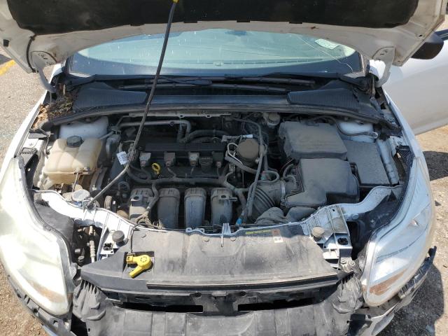 Photo 11 from auction – 2014 FORD FOCUS S with VIN 1FADP3E25EL254355
