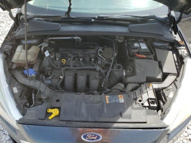 Photo 11 from auction – 2015 FORD FOCUS S with VIN 1FADP3E2XFL254921