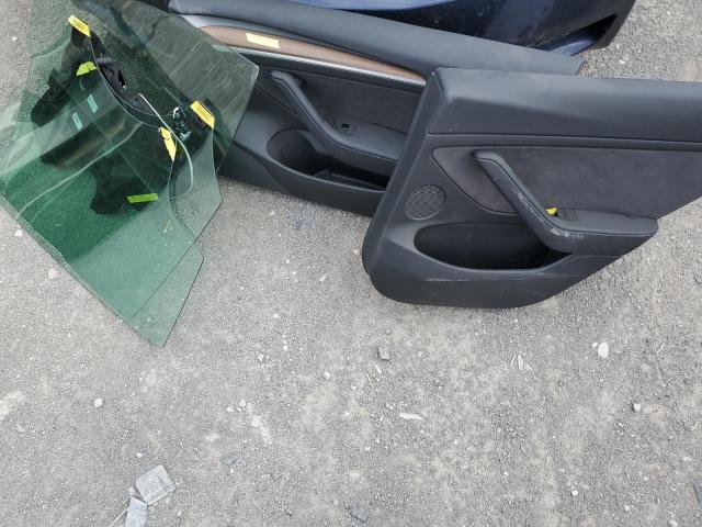 Photo 12 from auction – 2022 TESLA MODEL 3 with VIN 5YJ3E1EC3NF264149