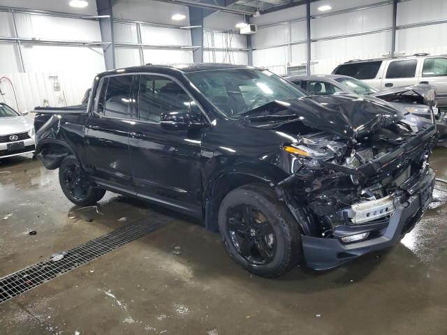 Photo 4 from auction – 2022 HONDA RIDGELINE with VIN 5FPYK3F86NB004470