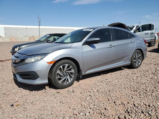 HONDA CIVIC EX 2017 with VIN 19XFC2F79HE019957 - Photo from auction
