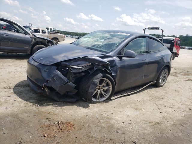 TESLA MODEL Y 2023 with VIN 7SAYGDEE6PA058829 - Photo from auction