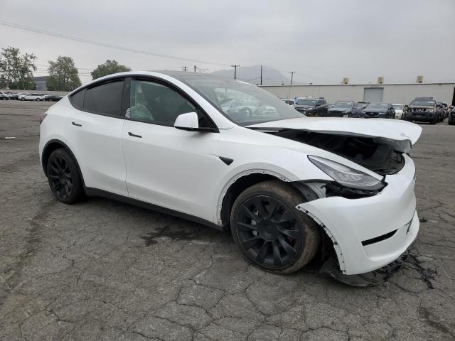Photo 4 from auction – 2023 TESLA MODEL Y with VIN 7SAYGDEEXPA042715