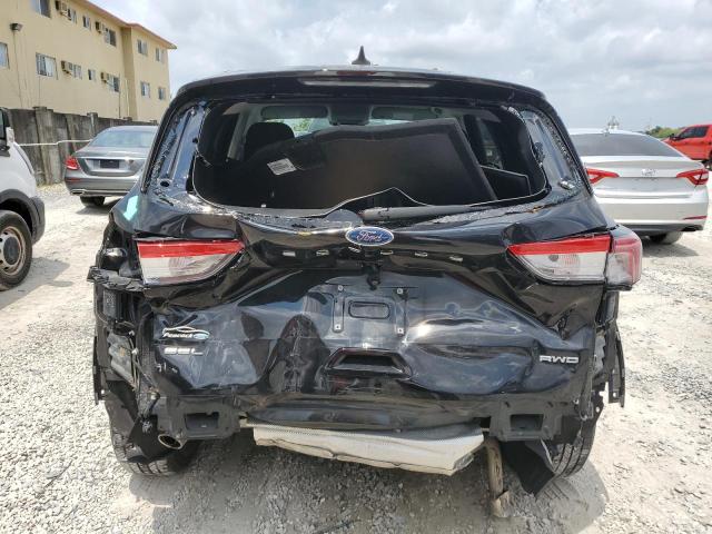 Photo 6 from auction – 2021 FORD ESCAPE SEL with VIN 1FMCU9H97MUA62174